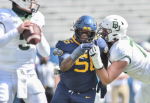WVU FOOTBALL NOTEBOOK: Darius Stills lives up to hype; Bryce Ford-Wheaton redeems himself; COVID issues strike team, marching band